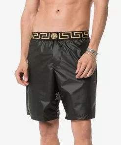 Versace logo waistband swim shorts