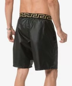 Versace logo waistband swim shorts