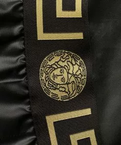 Versace logo waistband swim shorts