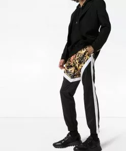 Versace panelled Baroque print track pants