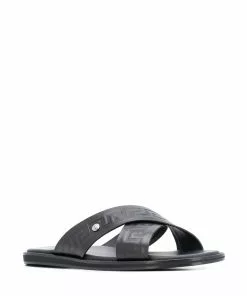 Versace embossed Greca crossover strap sandals
