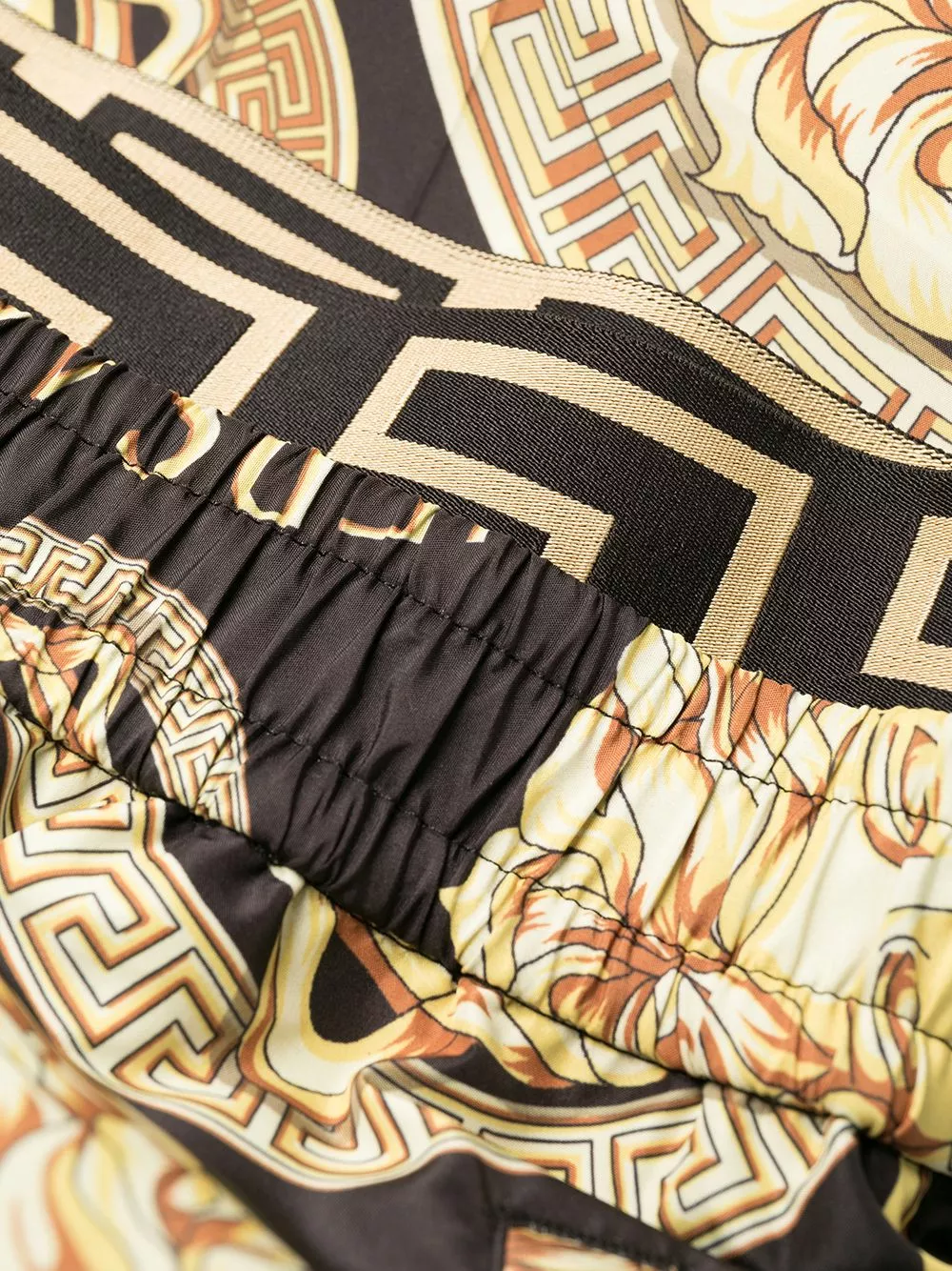 Versace Graphic print track pants 7 Versace graphic-print track pants