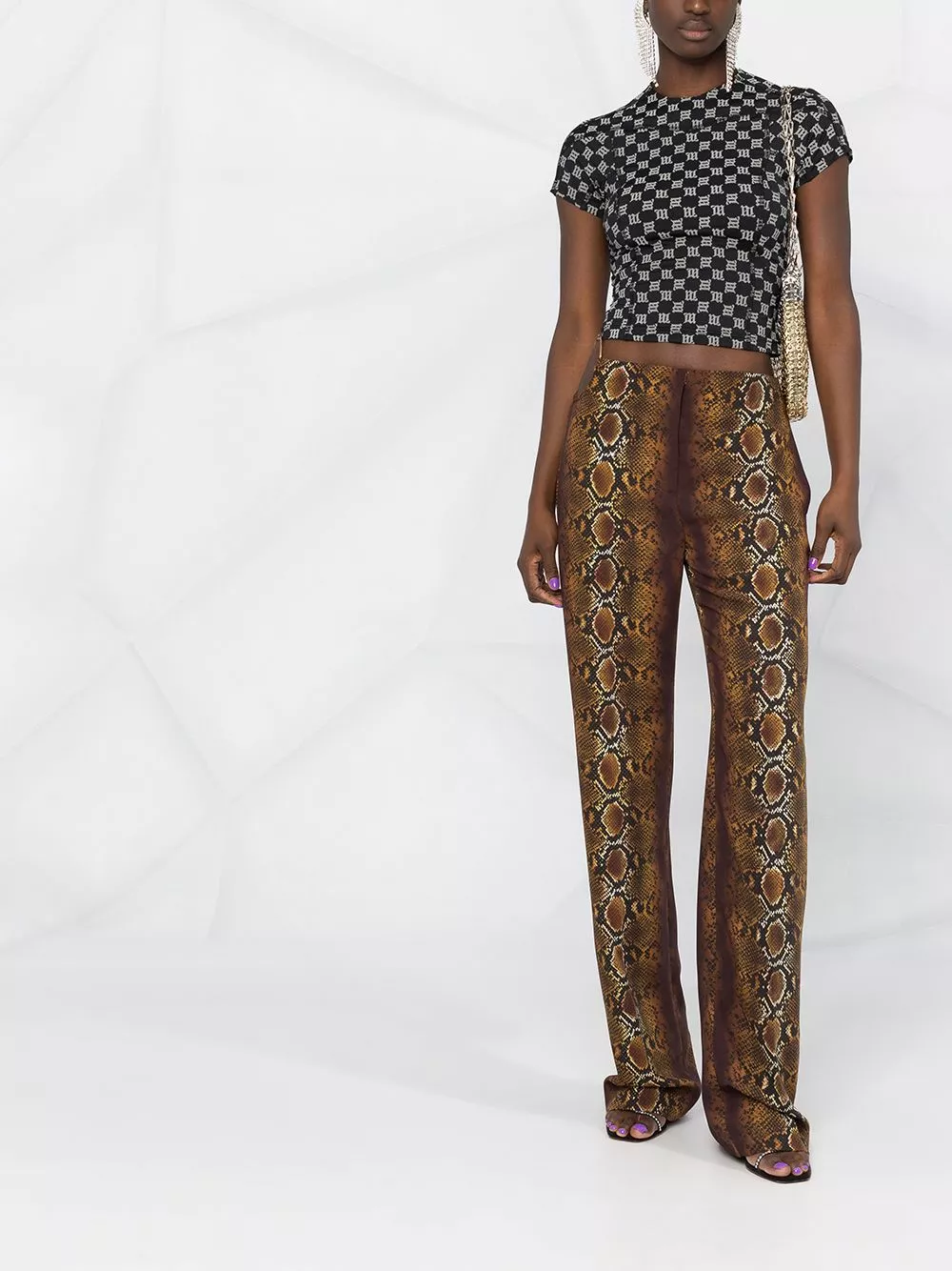 Versace Python print ring embellished trousers 4 Versace python print ring-embellished trousers