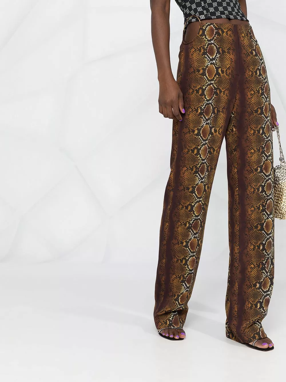 Versace Python print ring embellished trousers 7 Versace python print ring-embellished trousers