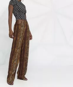 Versace Python print ring embellished trousers 15 Versace python print ring-embellished trousers