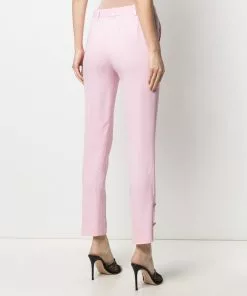 Versace button-embellished skinny trousers