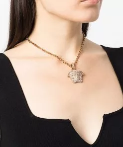 Versace crystal-embellished Medusa pendant neccklace