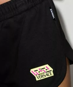 Versace La Greca patch running shorts
