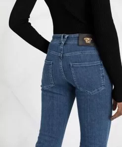 Versace logo-patch cropped jeans
