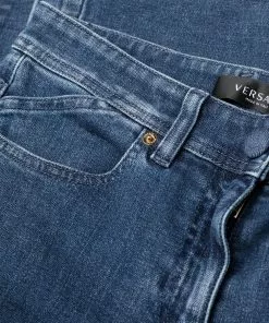 Versace logo-patch cropped jeans