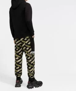 Versace Greca pattern logo print trousers 12 Versace Greca-pattern logo-print trousers
